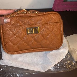 NEW crossbody purses In color plush pink and brown